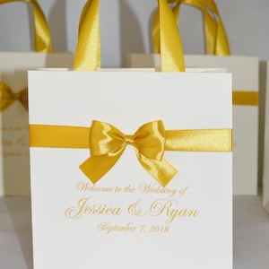 25 Ivory & Gold Hochzeits-Willkommenssäckchen mit Schleifengriffen, Schleife und Namen, Elegante personalisierte Hochzeitsgeschenke und Gastgeschenke