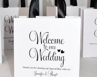 25 bruiloft welkomsttassen met satijnen lint handgrepen en uw namen, elegante gepersonaliseerde huwelijksgeschenken en gunsten voor uw gasten