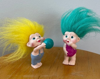 Vintage paar magische babytrollen uit de jaren 90