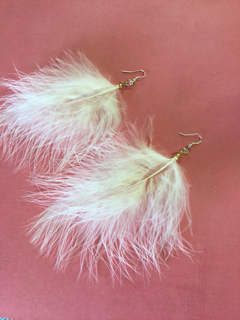 White feather earrings pierced hooks with 925 silver wires very pretty