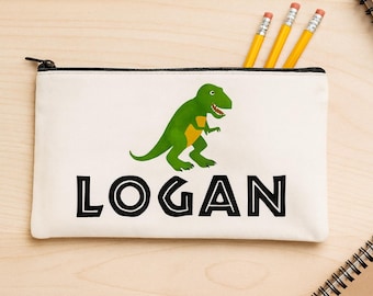 Estuche para lápices personalizado con diseño de T-Rex y cierre de cremallera con nombre personalizado.