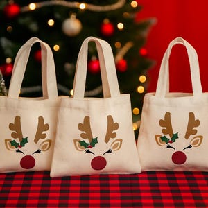 Pochettes pour cadeaux de Noël - Lot de trois sacs renne