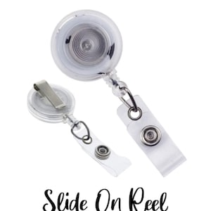 May include: Two clear plastic retractable badge reels with a silver clip and a clear plastic strap. The text "Slide On Reel" is printed below the reels.