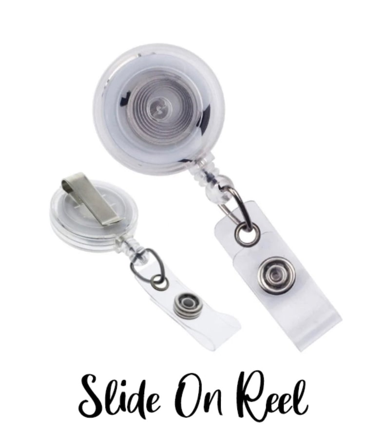 May include: Two clear plastic retractable badge reels with a silver clip and a clear plastic strap. The text "Slide On Reel" is printed below the reels.