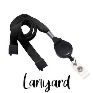 May include: Black retractable lanyard with a black clip and a clear badge holder. The lanyard is made of a woven fabric and has a metal swivel hook.