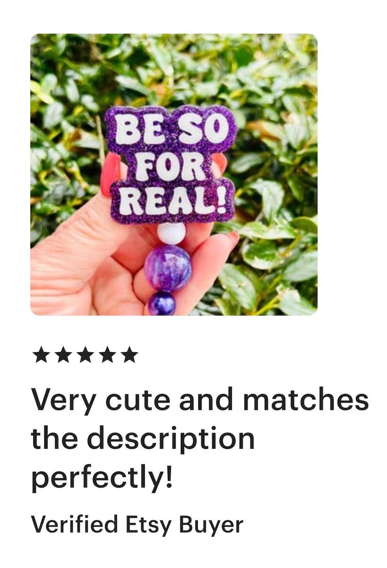May include: Purple and white beaded keychain with a purple glitter charm that says "BE SO FOR REAL!"