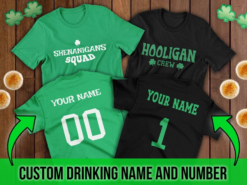Puede incluir: Dos camisetas verdes y negras con el texto "Shenanigans Squad" y "Hooligan Crew" en la parte delantera. La parte posterior de las camisetas tiene el texto "Your Name" y un n&uacute;mero.