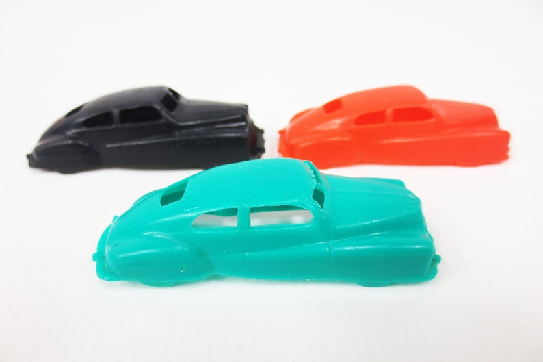 small plastic toy cars