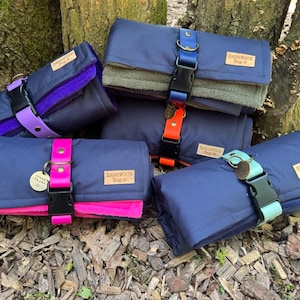 Navy blue Waterproof fleece-lined dog travel blanket with Biothane wrap and personalised hand-stamped brass tag bed mat portable place