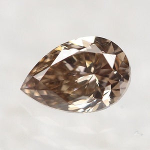 0.62 CT Natural Pear Shape Diamond: Fancy Brown Loose Diamond