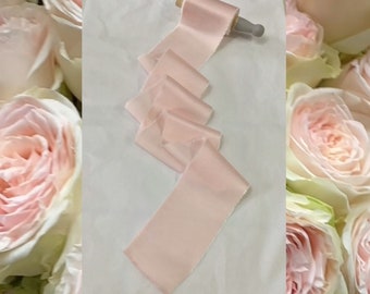 Hand dyed naturally raw edged bamboo silk ribbon, measuring approx 5-6cm x m with no joins in a soft blush pink  shade