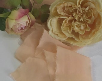 Hand dyed raw edged luxury raw edged crepe de chine silk ribbon, heavier than habotai silk ribbon approx 6cmx3m in a peach shade