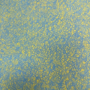 May include: Abstract pattern with a yellow background and blue scribbled lines. The lines are densely packed, creating a textured appearance. The design is a repeating pattern, with the blue lines contrasting against the yellow.