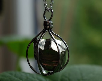 Raw crystal eco recycled sterling silver cage necklace