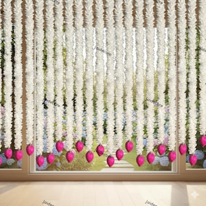 May include: White floral garlands hanging in vertical rows, adorned with vibrant pink heart-shaped accents. The garlands are suspended in front of a window, creating a decorative and elegant display. The overall aesthetic is soft and romantic.