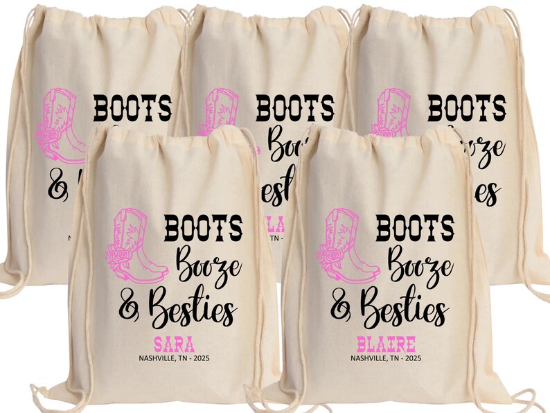 May include: A set of five off-white drawstring canvas bags featuring a pink cowboy boot graphic and the black text "BOOTS Booze & Besties". Two bags are personalized with the names "SARA" and "BLAIRE" above "NASHVILLE, TN - 2025" in pink text.