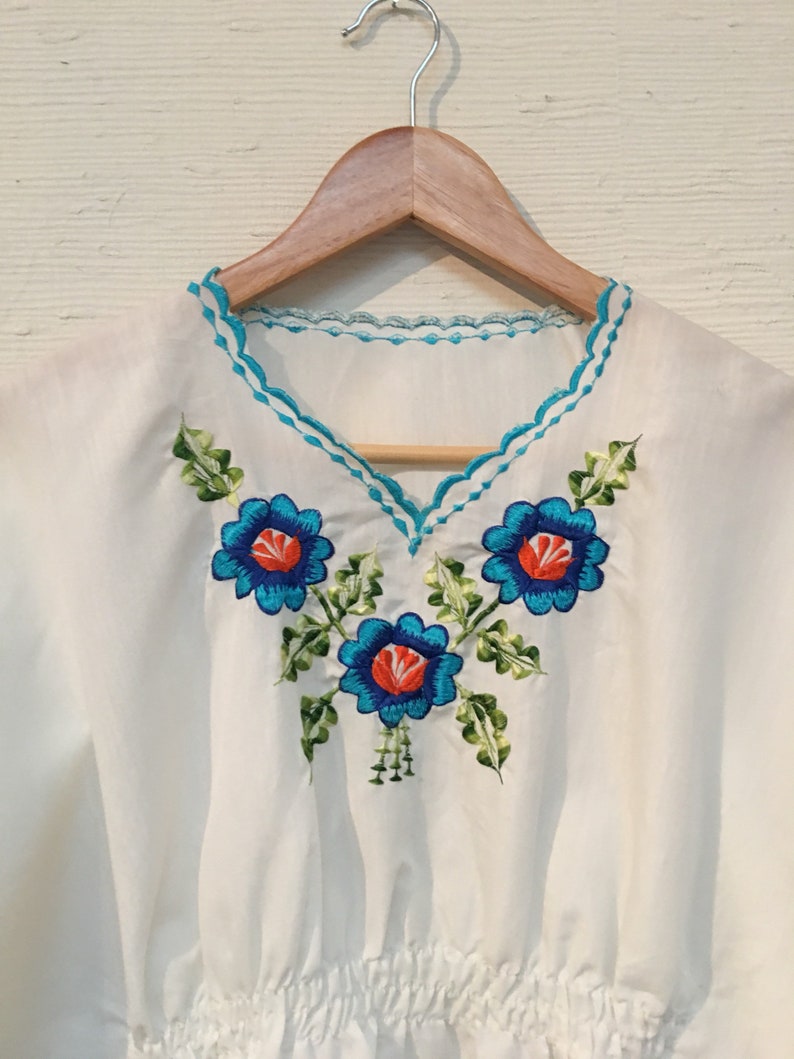 Blue floral embroidered butterly sleeve top