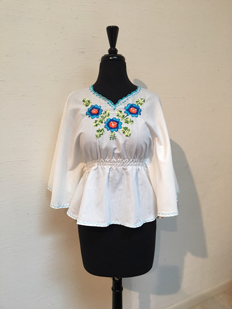Blue floral embroidered butterly sleeve top