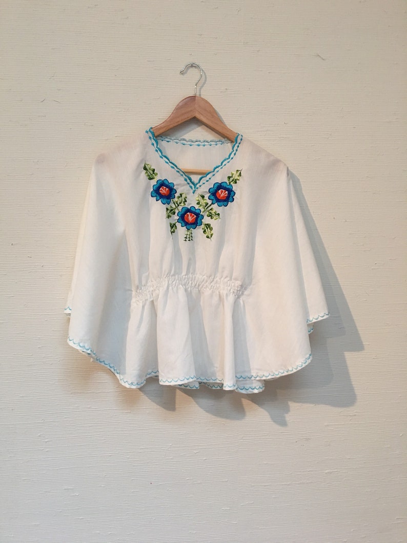 Blue floral embroidered butterly sleeve top