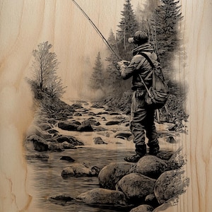 May include: Black and white illustration of a person fly fishing in a river. The person is standing on rocks, holding a fishing rod, with a forest in the background. The artwork is on a wooden surface.