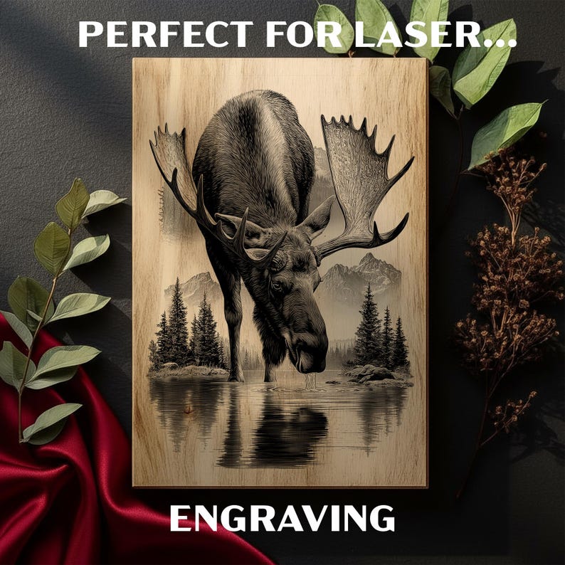 May include: Wooden wall art featuring a detailed illustration of a moose drinking from a lake, with mountains and pine trees in the background. The text "ENGRAVING" is at the bottom. The text "PERFECT FOR LASER..." is at the top.