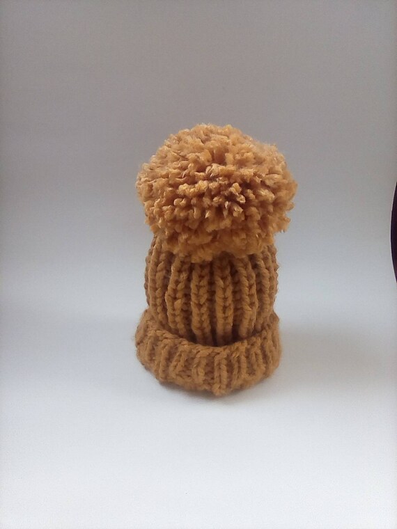 mustard bobble hat