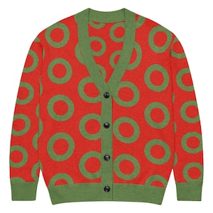 May include: A long-sleeve knit cardigan in bright red featuring a repeating pattern of olive green circles. The garment has a V-neckline, a button-down front with four dark buttons, and solid olive green ribbed trim on the cuffs and hem.