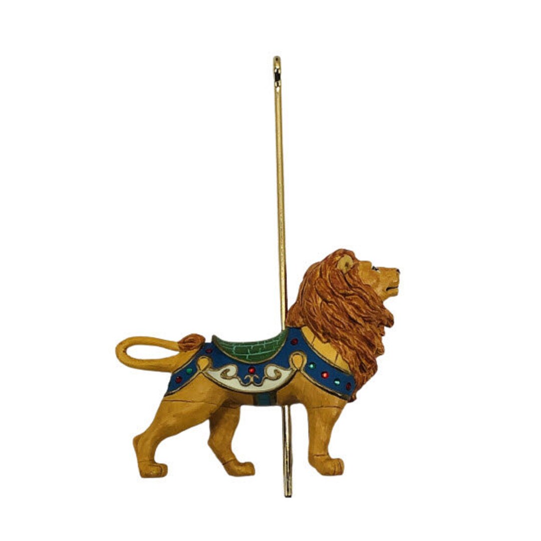 Lion de carrousel image stock. Image du amusement, juste - 3910769