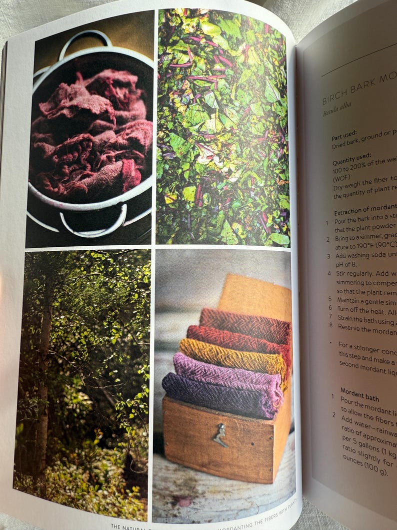 May include: A page from a book on natural dyeing, featuring four images. One shows a pot of dyed fabric, another shows green leaves, a third shows a forest, and the last shows a wooden box with colorful, woven fabric.