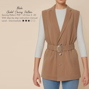 May include: A tan jacket sewing pattern, labeled "Blake," with a step-by-step instruction manual. The jacket is belted at the waist with a silver buckle. The pattern is for US sizes 2-20 and is rated intermediate.