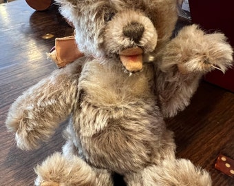 Vintage Teddy Bear with Felt Paws Jointed Child's Open Mouth 7 inches tall by 5 inches wide ribbon unsigned