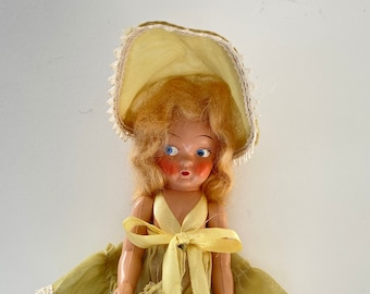 1940s VIRGA DOLL 5-1/2" Hard Plastic Doll With Jointed Arms and Painted Face, Yellow Hat and Dress, Painted Shoes, ADORABLE!!