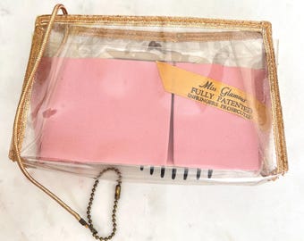 Vintage MISS GLAMOUR Clear Cosmetic Make Up Bag and Coin Purse, Pink Fabric, Brown Hair Comb, "Fully Patented Infringers Prosecuted"