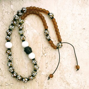 Buddha Leather Necklace: Krobo Beads, Lampwork Glass, Ethnic Style