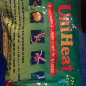 May include: A green UniHeat multi-purpose jumbo shipping warmer. The package features illustrations of insects, a lizard, and a flower. Text includes "72+ HOURS" and "Designed for reliable and steady heat release for 72 hours."