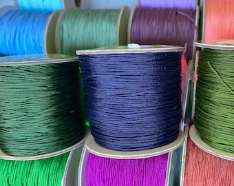 Cordón de nailon para bisutería: 0,6/0,8 mm, 130/150 metros, 33 colores.