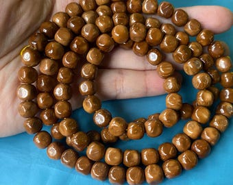 Kuka Beads Strand: Trädistanspärlor för smyckestillverkning