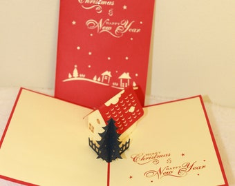 Biglietto di Natale pop-up fatto a mano: casa e albero