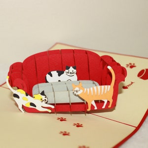 Chats 3d pop-up sur le canapé/carte pop-up/carte d'anniversaire pop-up