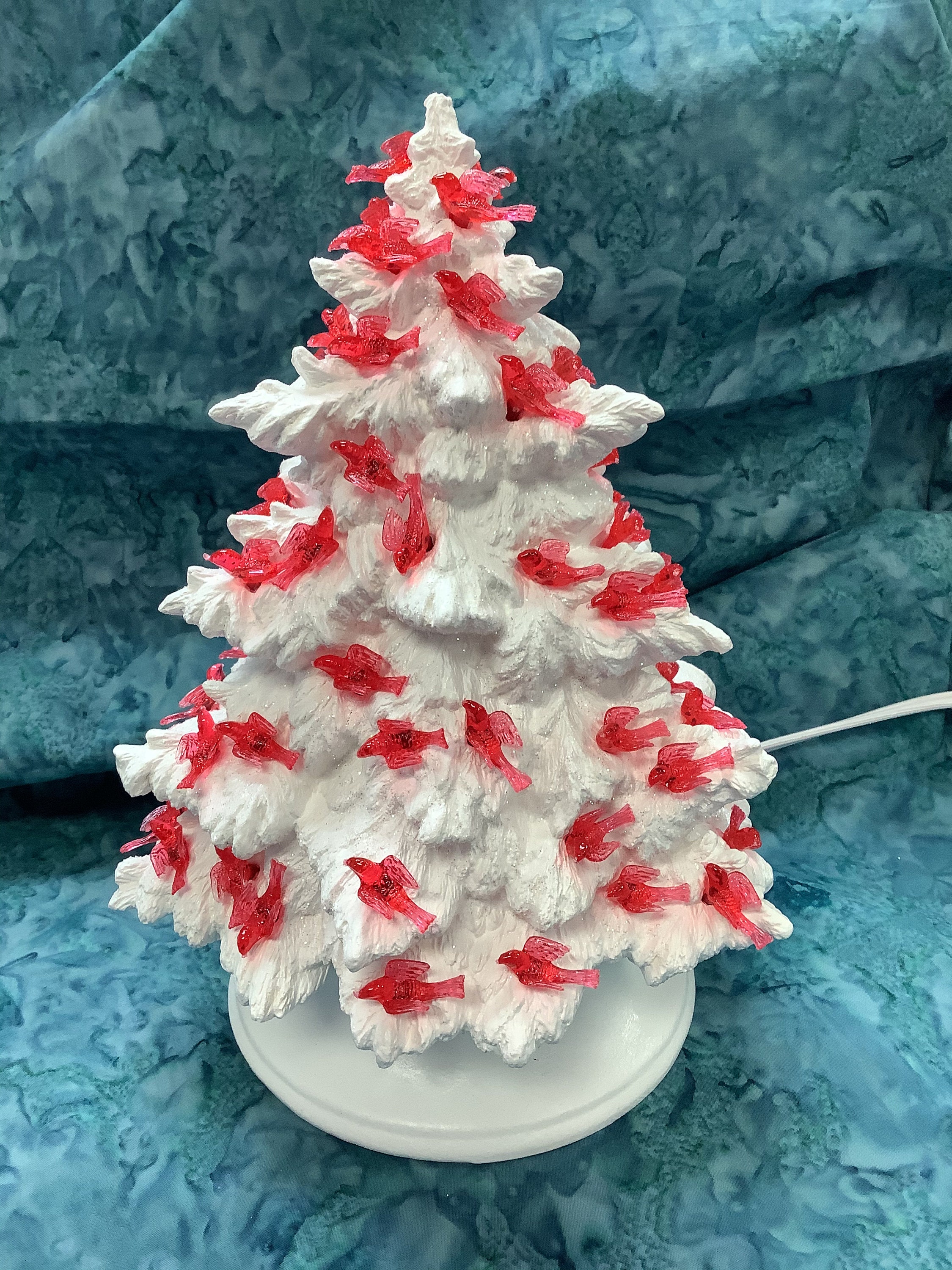 white christmas tree with cardinals