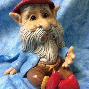 Ceramic sitting gnome