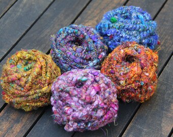 hand spun Art Yarn Super Coils Sunset over Fields Merino and Cotton.
