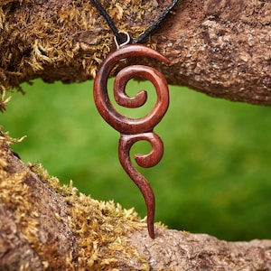 Wooden Spiral Pendant made from Reclaimed Rosewood and hung on a adjustable Waxed Cotton Thong.