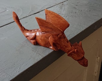 Small,but Cute Handcarved Wooden Dragon.finished to a high quality.