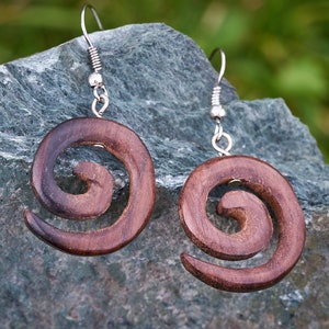 Simple but stunning Wooden spiral earrings made from reclaimed Rosewood and hung on Sterling Silver hooks
