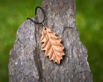 Wooden Oak Leaf Pendant made from 350 Year old recycled Oak hung on a waxed Cotton thong