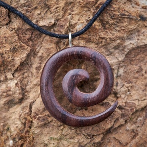 Small Wooden Spiral Pendant made from reclaimed Rosewood and hung on a Waxed Cotton Thong. image 1