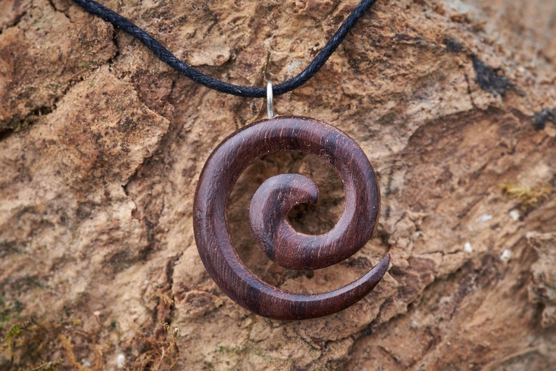 Small Wooden Spiral Pendant made from reclaimed Rosewood and hung on a Waxed Cotton Thong. image 1