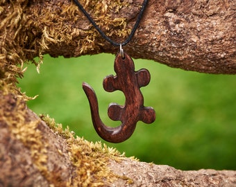 Wooden Lizard Shaped Pendant made from reclaimed Rosewood and hung on a adjustable waxed Cotton thong