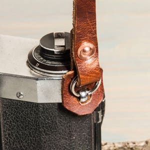 Hand made chestnut leather camera strap with copper rivets. image 3